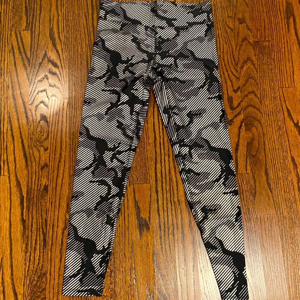 Women’s Terez black and silver metallic leggings. Size M. Like new